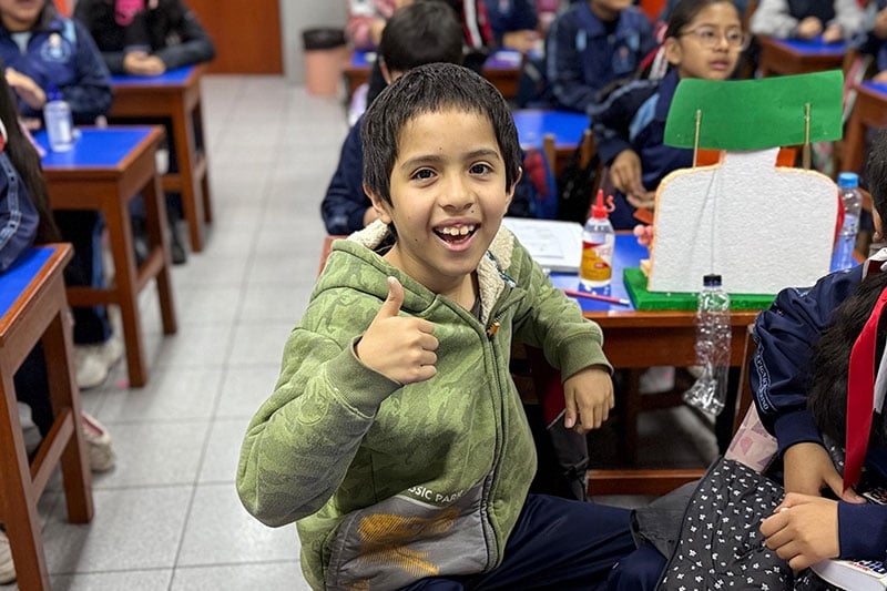 Student in classroom in Latin America.